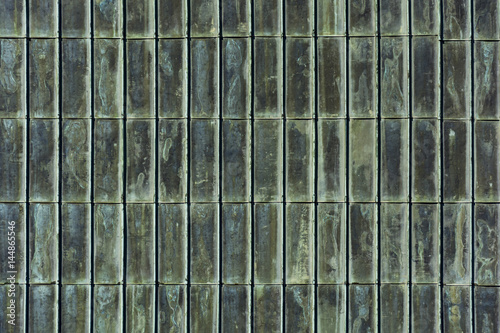 Historical copper roof with green verdigris. Background verdigris texture.