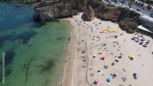 Lagos beach algarve portugal aerial drone fly over travel video view from above