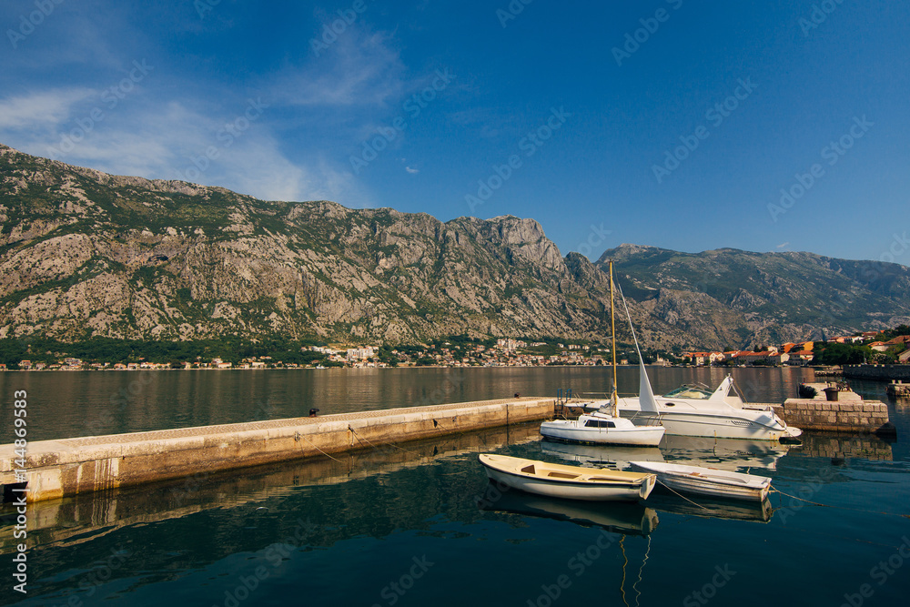Boka-Bay mountains and boats marina in Montenegro, Kotor Bay
