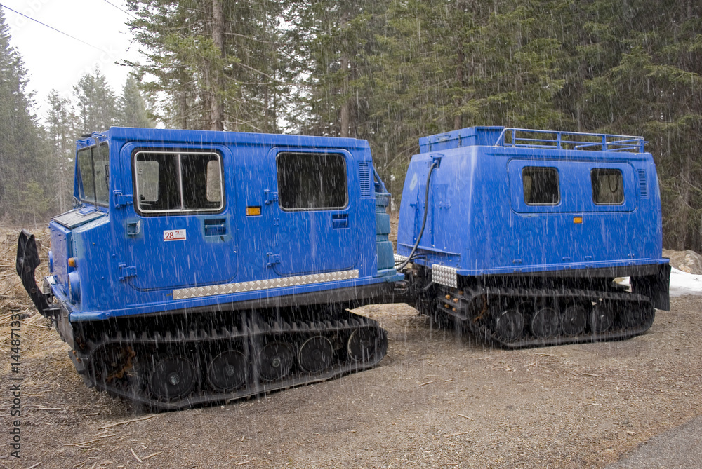 small snowcat with second wagon attached to the trailer coupling