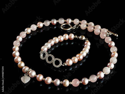 Necklace and bracelet made from freshwater pearls and quartz
