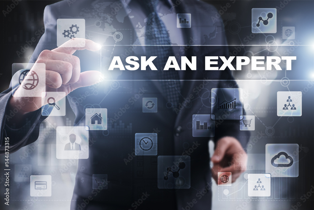 Fototapeta premium Businessman selecting ask an expert on virtual screen.