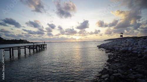 Beach, rocky beach, beautiful beach, wooden bridges, wooden bridges along the beach, Sattahip, Chonburi, Thailand. © FotoArtist