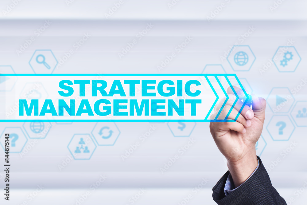 Businessman drawing on virtual screen. strategic management concept. Businessman drawing on virtual screen. strategic management concept.