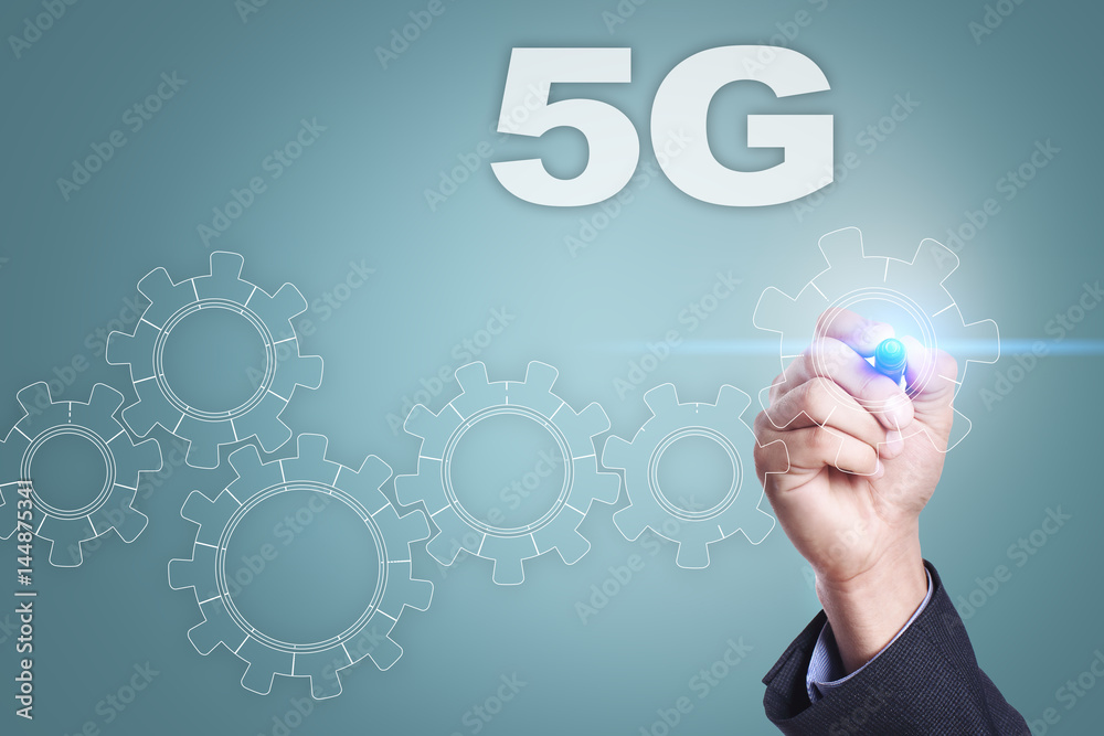 Fototapeta premium Businessman drawing on virtual screen. 5g concept
