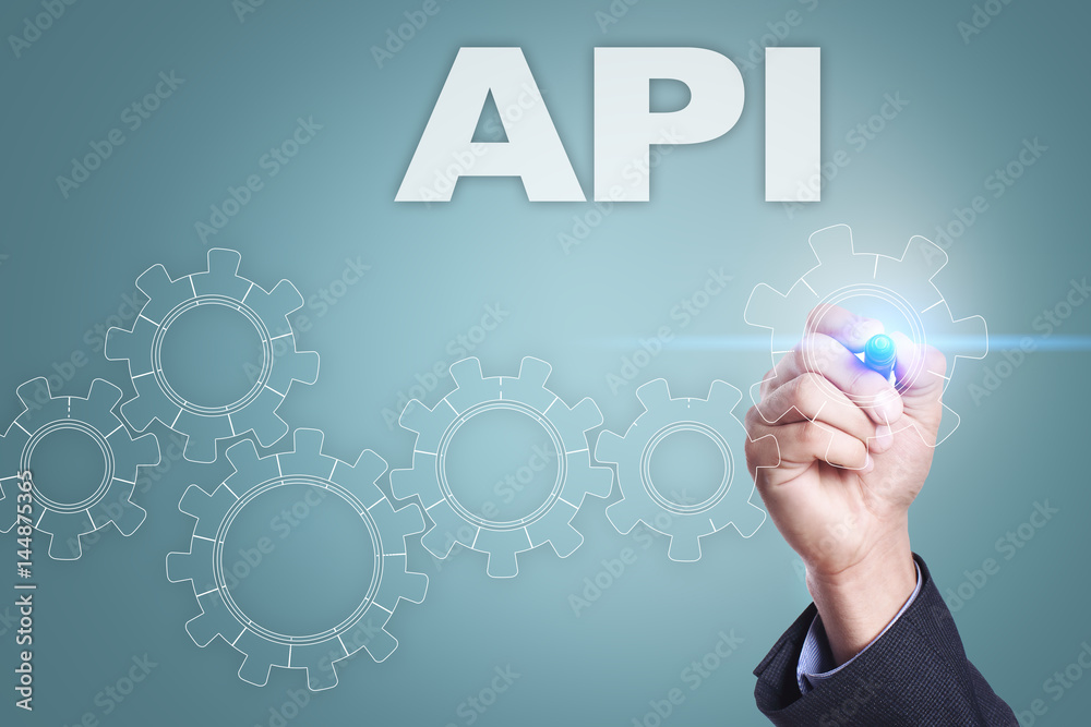 Businessman drawing on virtual screen. api concept Businessman drawing on virtual screen. api concept