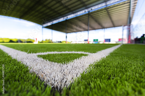 close up White line corner on a soccer field grass ,soft focus 