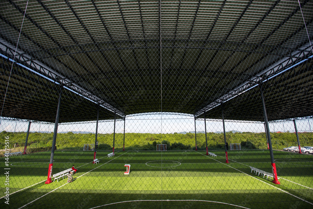 Obraz premium Football field Small, Futsal ball field in the gym indoor, Soccer sport field outdoor park with artificial turf
