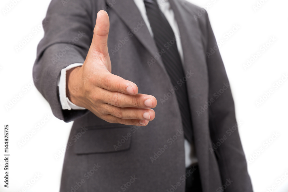 A business man with an open hand ready for handshaking to seal a deal A business man with an open hand ready for handshaking to seal a deal