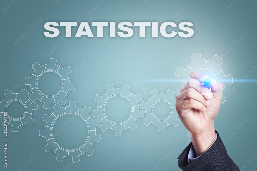 Businessman drawing on virtual screen. statistics concept Businessman drawing on virtual screen. statistics concept