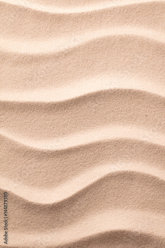 ripples in sand on beach , texture background.