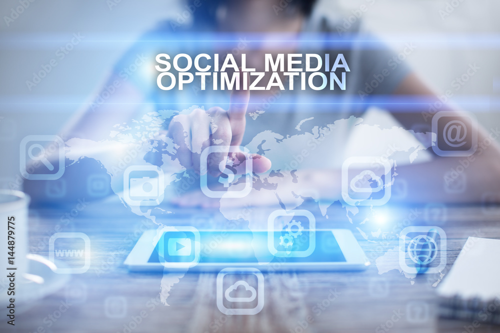 Woman pressing on virtual screen and selecting social media optimization Woman pressing on virtual screen and selecting social media optimization