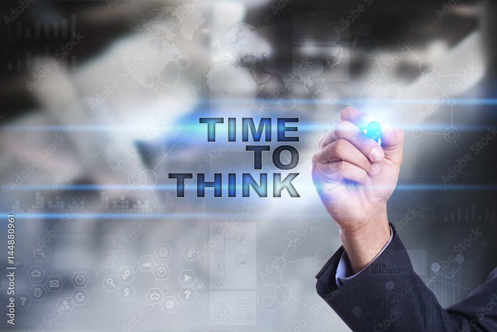 Businessman is drawing on virtual screen. time to think concept. Businessman is drawing on virtual screen. time to think concept.