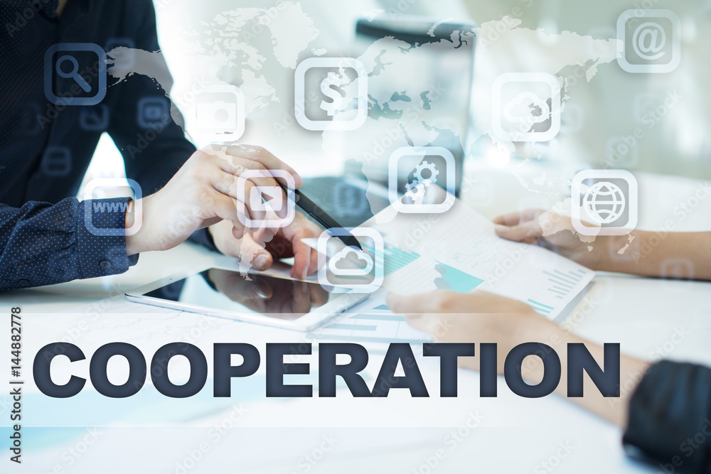 cooperation on virtual screen. Business, technology and internet concept. cooperation on virtual screen. Business, technology and internet concept.