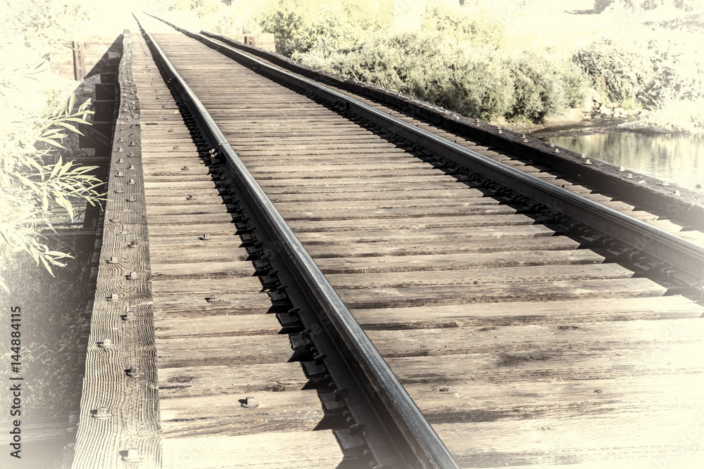 Fototapeta premium railroad tracks over river