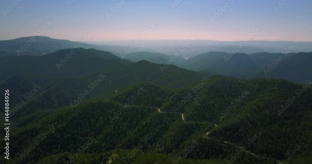 Flight over the cedar valley. landscape of mountains in the mist Cyprus.Drone Point of View Platres in the Troodos. Cyprus. Aerial View. Flying over the mountains 