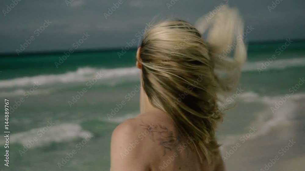 fashion portrait of a girl on the sea fashion portrait of a girl on the sea