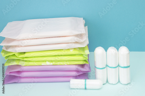 Menstruation cotton sanitary pads and tampon for woman hygiene protection. Soft tender protection for woman critical days, gynecological menstruation cycle
