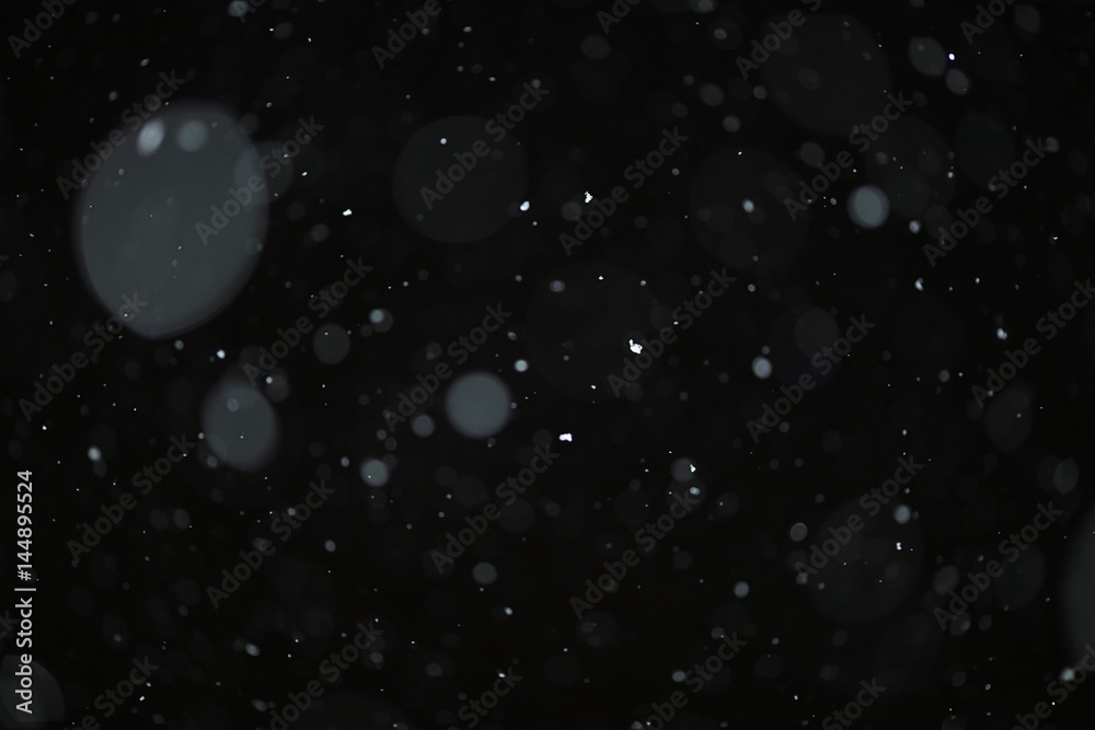 snow on a black background texture overlay bokeh highlights snow on a black background texture overlay bokeh highlights