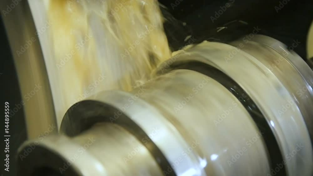 Closeup Coolant Flows down on Turning Milling Machine Closeup Coolant Flows down on Turning Milling Machine