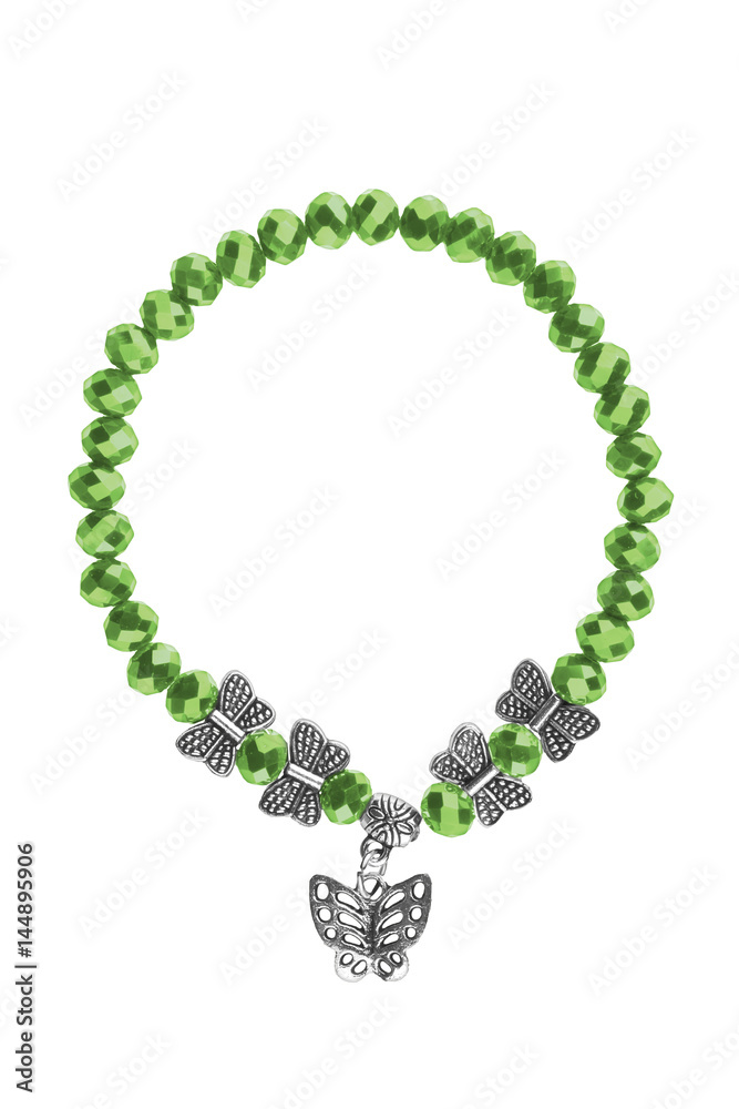 Obraz premium Elastic bracelet with green irregular beads and silver butterflies charms, isolated on white background, clipping path included.