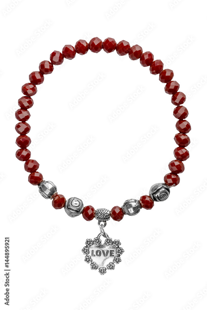 Elastic bracelet with red irregular beads and silver Love charms, isolated on white background, clipping path included. Elastic bracelet with red irregular beads and silver Love charms, isolated on white background, clipping path included.