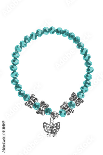 Elastic bracelet with turquoise irregular beads and silver butterflies charms, isolated on white background, clipping path included.