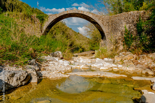 Ancient medieval stone bridge in siena in tuscany photo