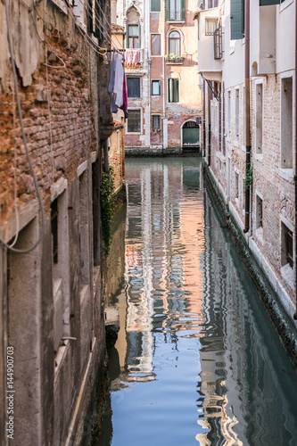 colorful canal in Venice at sunset