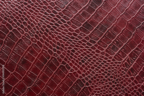 Crocodile leather for manufacturing of luxury shoes, clothes, bags and other fashion accessories, high quality natural seamless material sample, textured background, top view 
