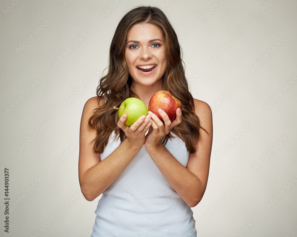 young woman holding apples. red and green. young woman holding apples. red and green.