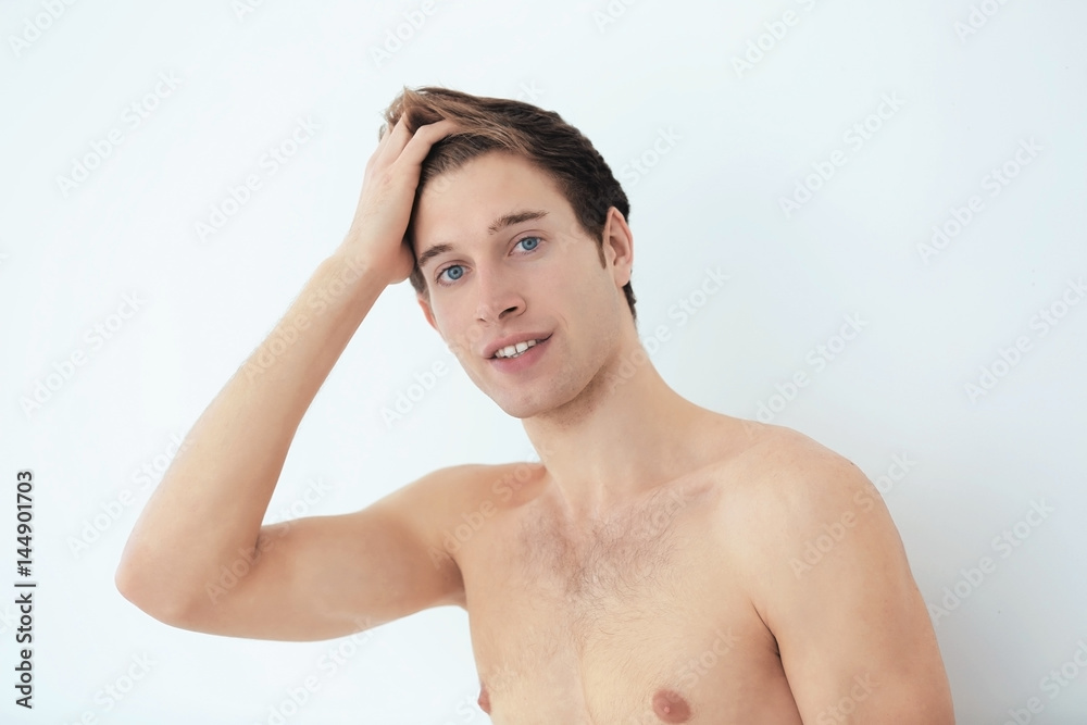 Obraz premium Handsome young man on light background