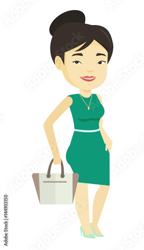 Woman posing on catwalk during fashion show.