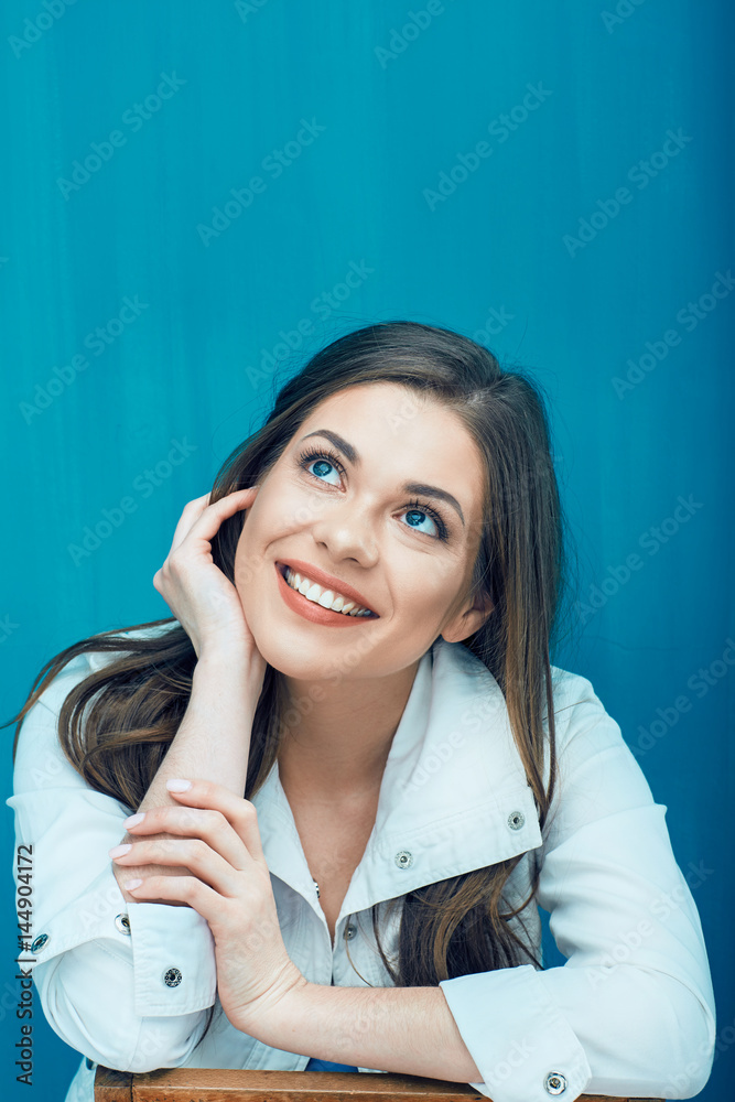 Close up face portrait of smiling young woman. Close up face portrait of smiling young woman.