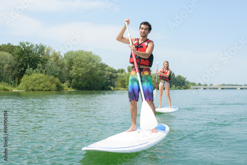 touring around on a paddle board