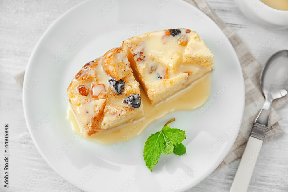Delicious bread pudding with fruits on plate Delicious bread pudding with fruits on plate