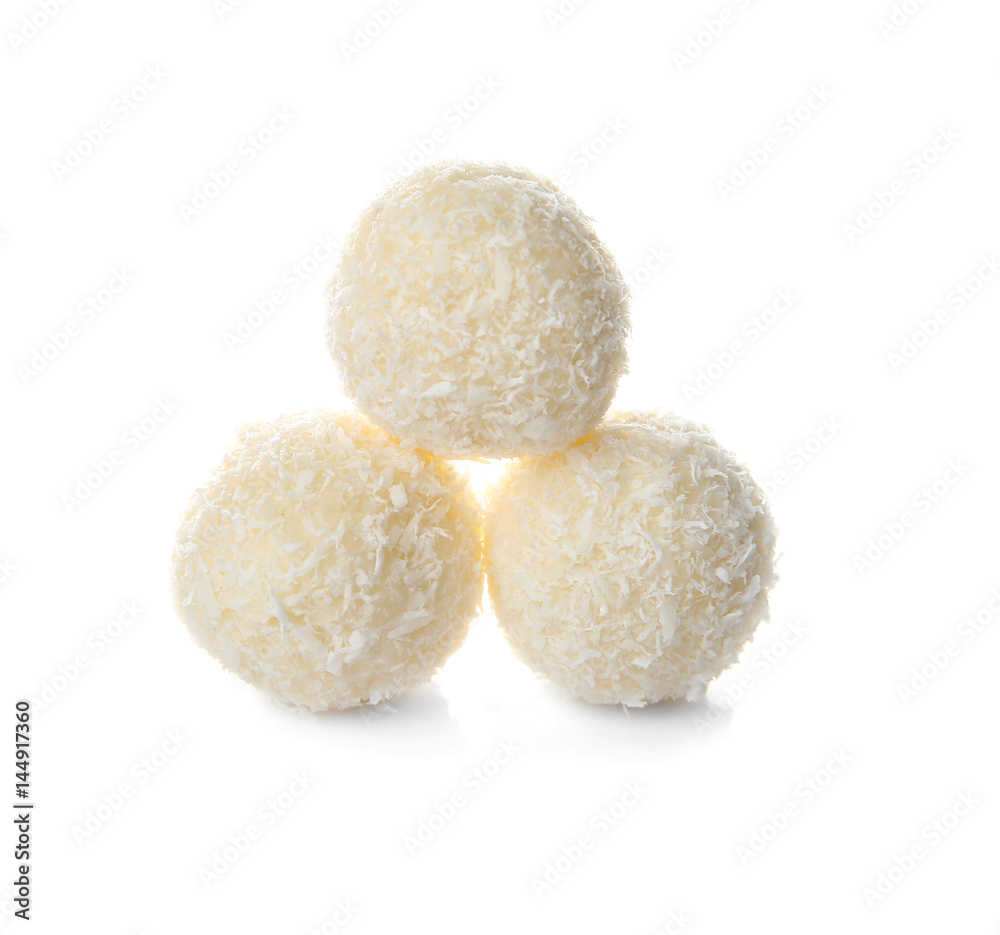 Coconut candies on white background