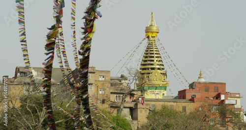 Thousands of Tibetant Prayer Flags can be seen at Swayambhunath (Monkey Temple) Stupa in Kathmandu, Nepal. photo