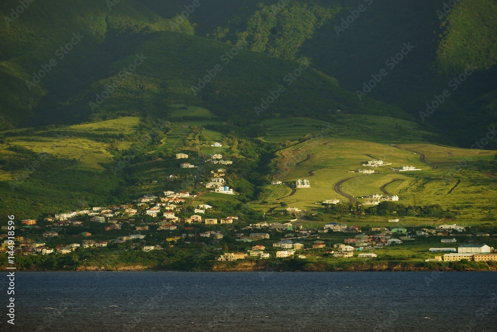 Saint Kitts Island landscape - closer view of a hill slope with sun and shade patches