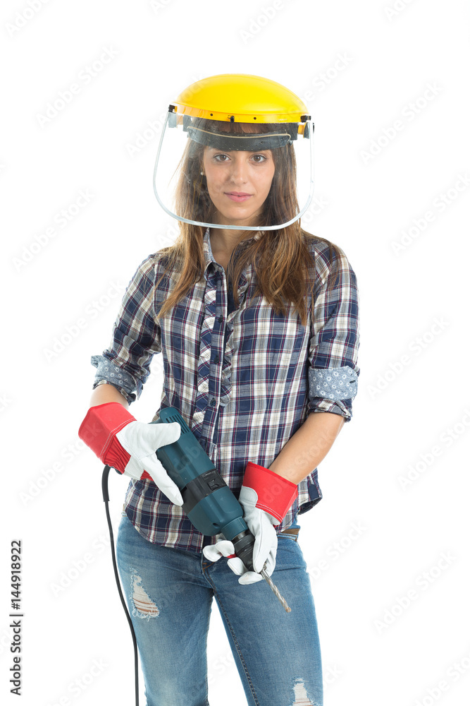 Attractive young woman builder with drill tool happy for good work. Isolated on white background. Attractive young woman builder with drill tool happy for good work. Isolated on white background.