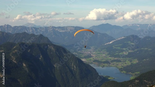 Skydiver or Paraglider over Austrian Alps Mountains. 4K  photo