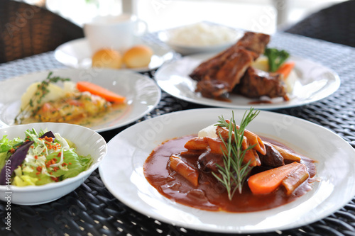 Meals of carrot pasta with salad dish