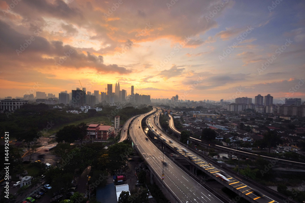 Dramatic sunset view over the Kuala Lumpur city sky crappers.