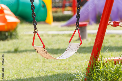 Swings in colorful playground.
