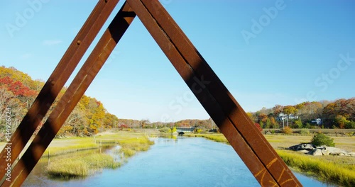 Old Trolly Bridge with a train in the background at Stony Creek, Connecticut. 