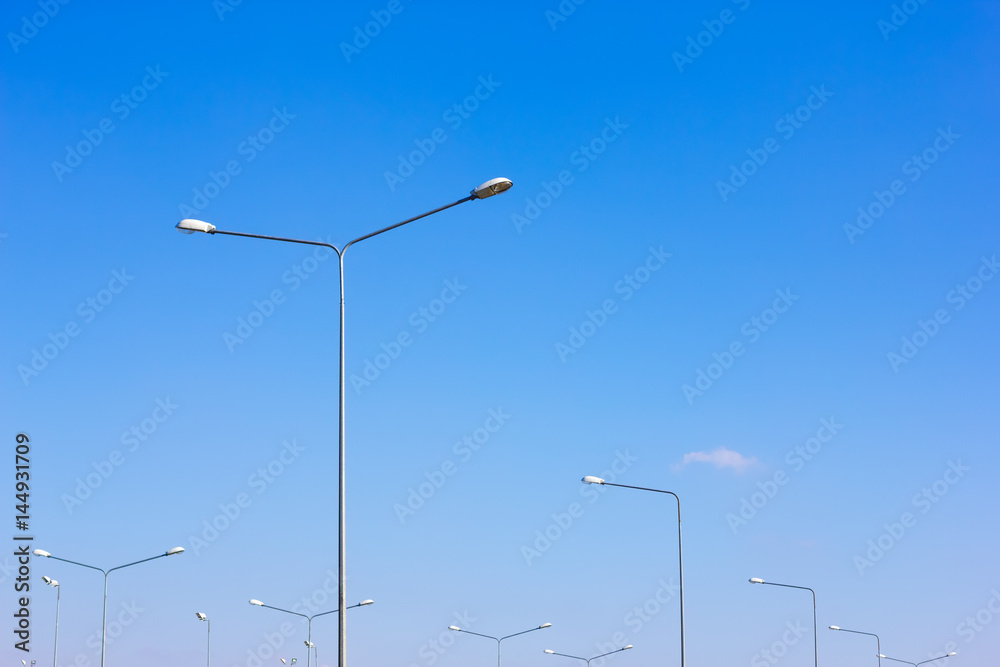 Street lights against the sky blue sky Street lights against the sky blue sky