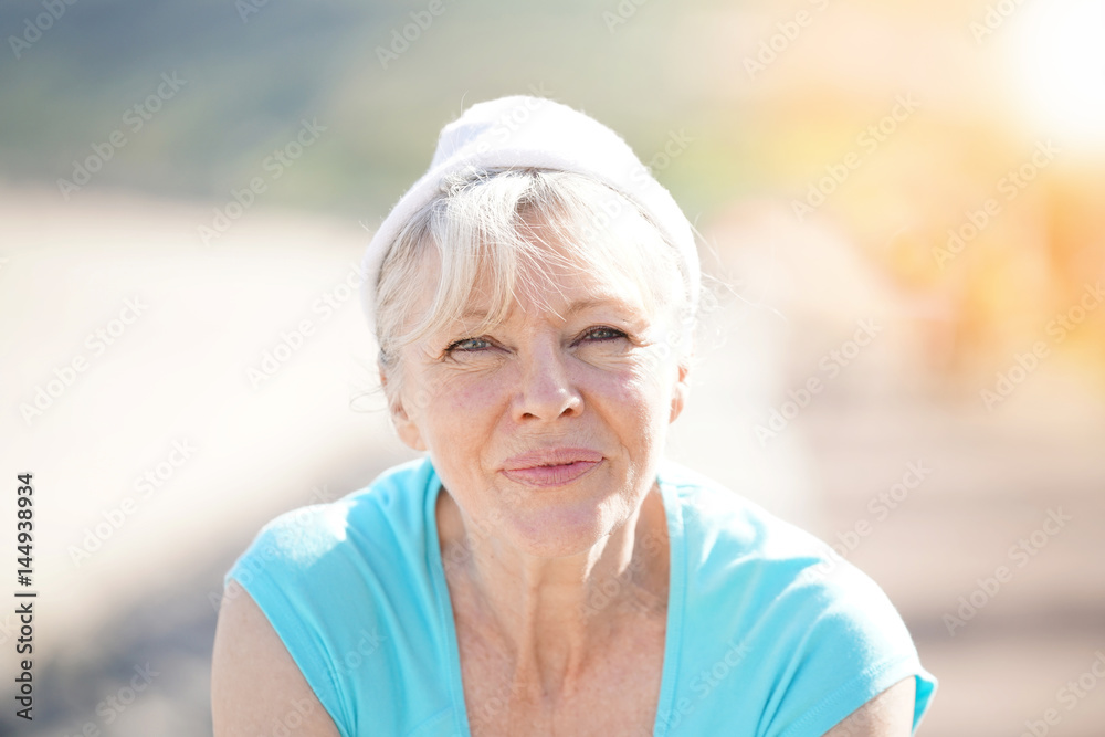 Portrait of senior woman in fitness outfit