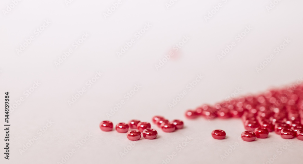 Heaps of red glass beads Heaps of red glass beads