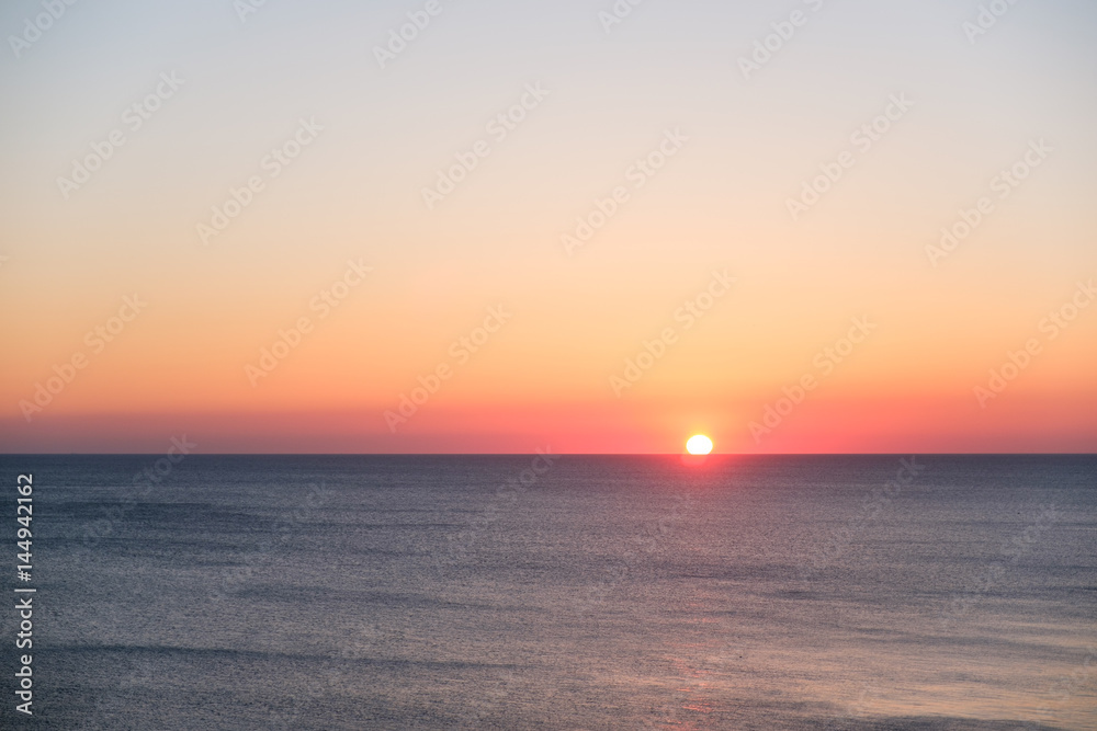 sunset over the sea, scenic seascape at evening
