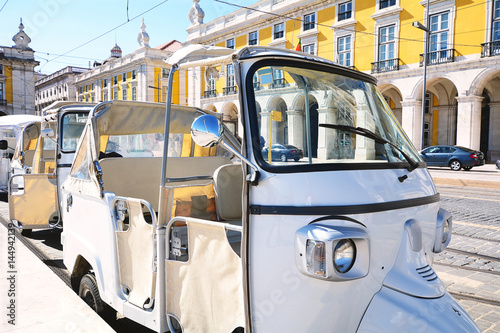 Tuk tuk on street of Lisbon in Portugal photo